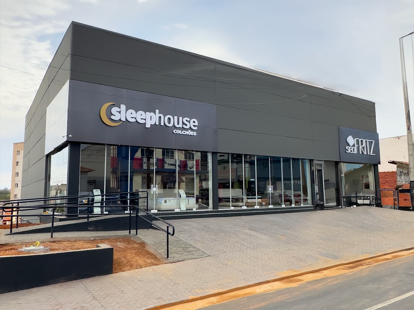 Fachada de uma loja Sleep House Colchões